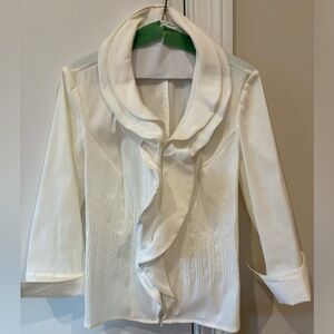 White ruffled blouse